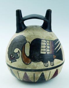 UNKNOWN ARTIST (Peruvian) Bridge-Spout Vessel, 100–300 buff clay with polychrome slip Museum Purchase, Florence C. Quinby Fund, in memory of Henry Cole Quinby, Honorary Degree, 1916 1969.86