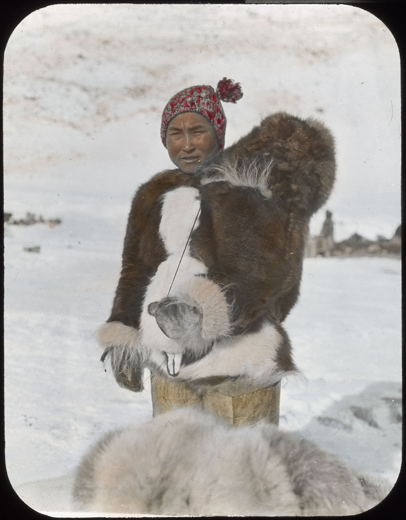 Donald Baxter MacMillan; Woman of Northwest Greenland. Baby in hood; 1913-1917; image; silver gelatin on glass; 10.16 cm x 8.26 cm x 0.64 cm (4 in. x 3 1/4 in. x 1/4 in.); TGM; North America