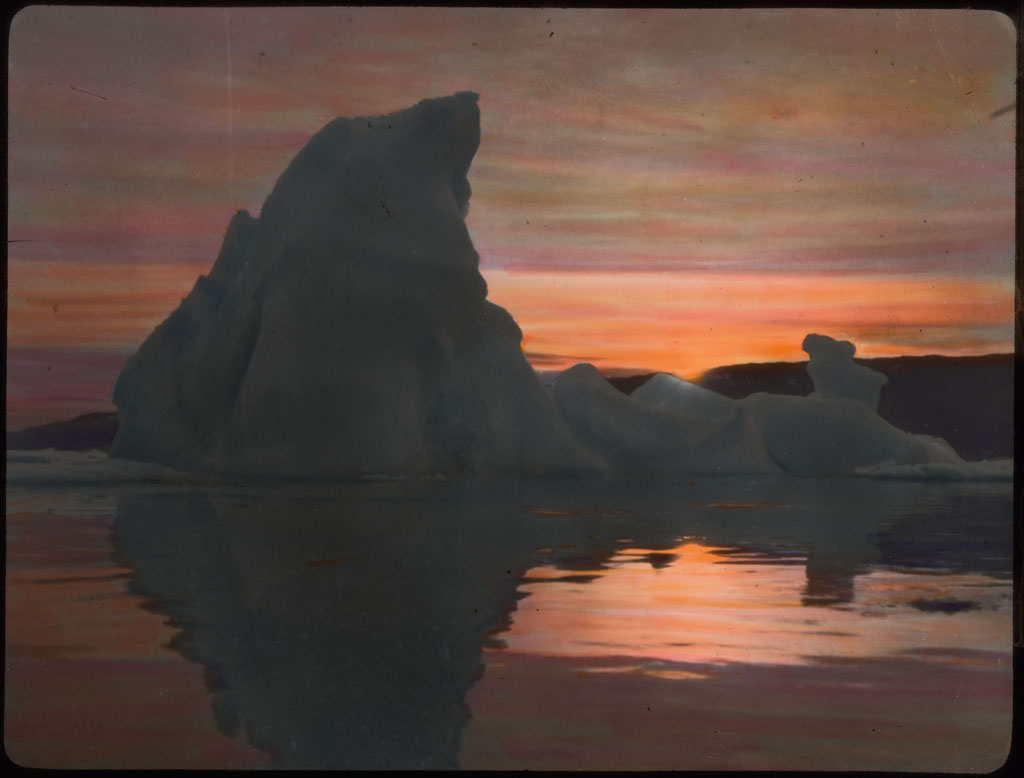 Donald Baxter MacMillan; Sunset Over Iceberg Near Etah; 1913-1917; image; silver gelatin on glass; 10.16 cm x 8.26 cm x 0.64 cm (4 in. x 3 1/4 in. x 1/4 in.); TGM; North America