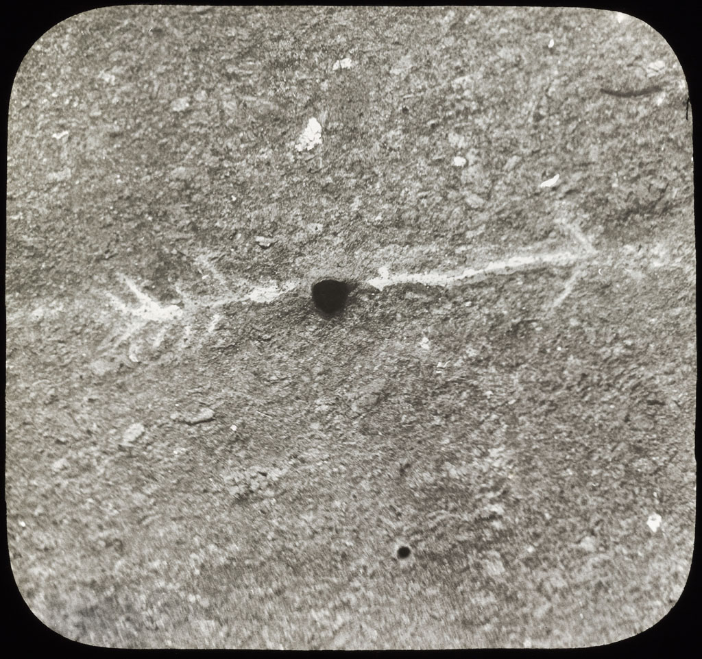 Donald Baxter MacMillan; Arrow in rock carved by Dr. Kane; 1913-1917; image; silver gelatin on glass; 10.16 cm x 8.26 cm x 0.64 cm (4 in. x 3 1/4 in. x 1/4 in.); TGM; North America