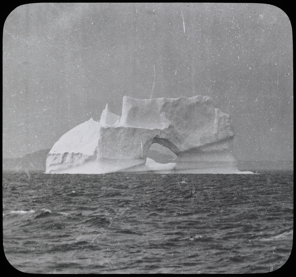 Donald Baxter MacMillan; Iceberg with hole.; 1913-1917; image; silver gelatin on glass; 10.16 cm x 8.26 cm x 0.64 cm (4 in. x 3 1/4 in. x 1/4 in.); TGM; North America