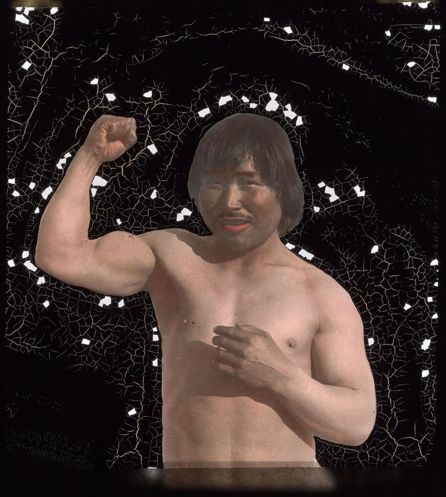 Etuk-a-suk showing his muscles